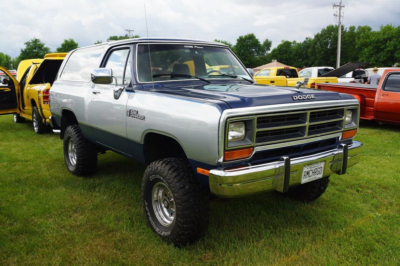 Two-tone 1990 Dodge Ramcharger 4x4 on grass at a Mopar show